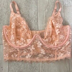 Light pink/orange/coral colored bralette. 
Brand: Victoria’s Secret 
Size: 34C